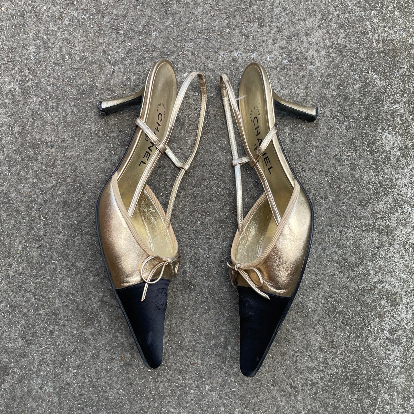 CHANEL ‘CC’ Gold Leather Black Satin Cap Toe Slingback Heels