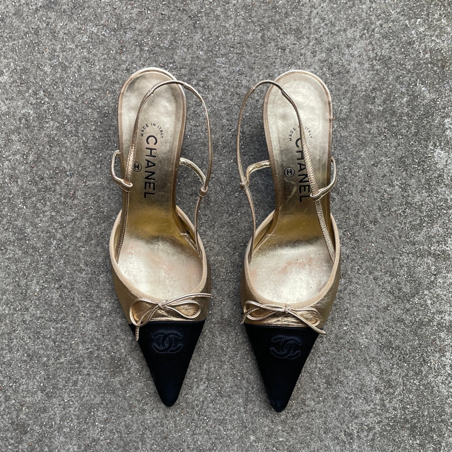 CHANEL ‘CC’ Gold Leather Black Satin Cap Toe Slingback Heels