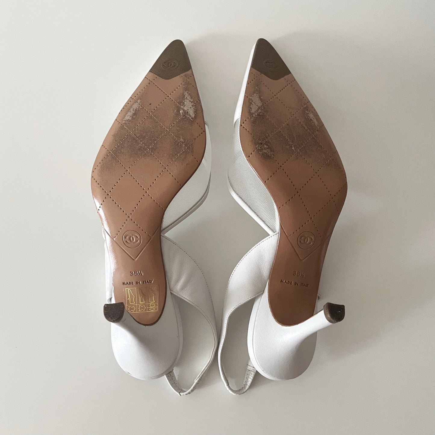 Chanel “CC” White Leather Slingback Heels
