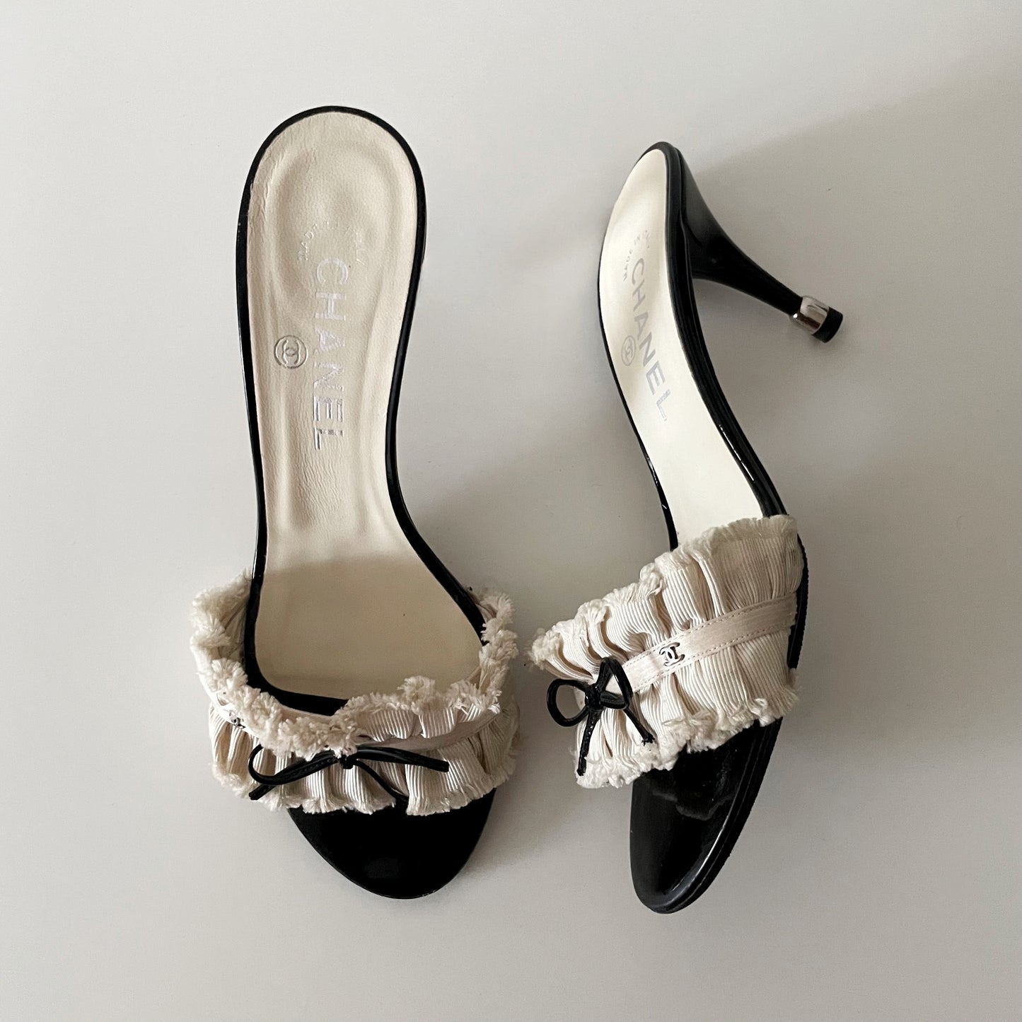 Chanel “CC” Ivory Ruffle Bow Sandal Heels