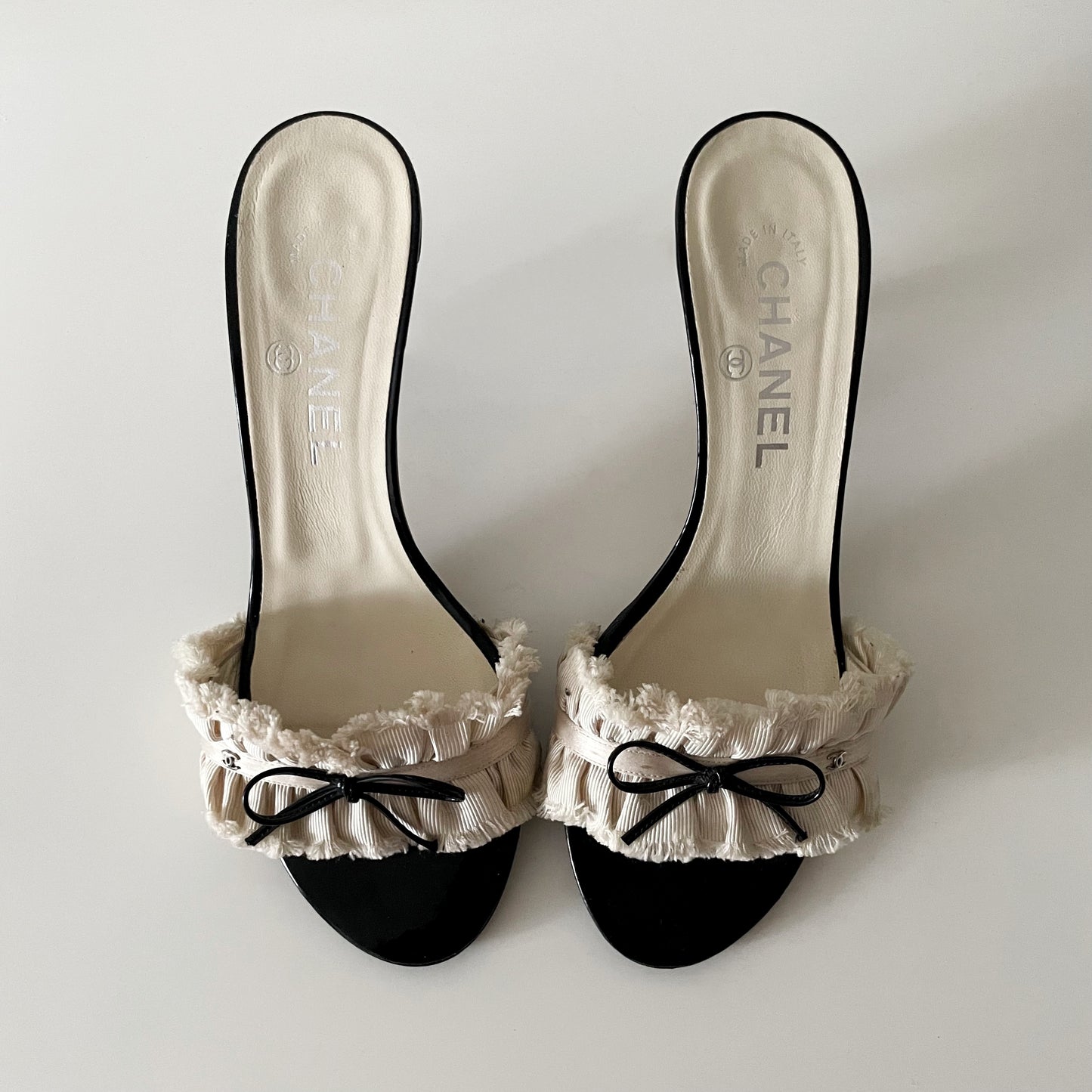 Chanel “CC” Ivory Ruffle Bow Sandal Heels