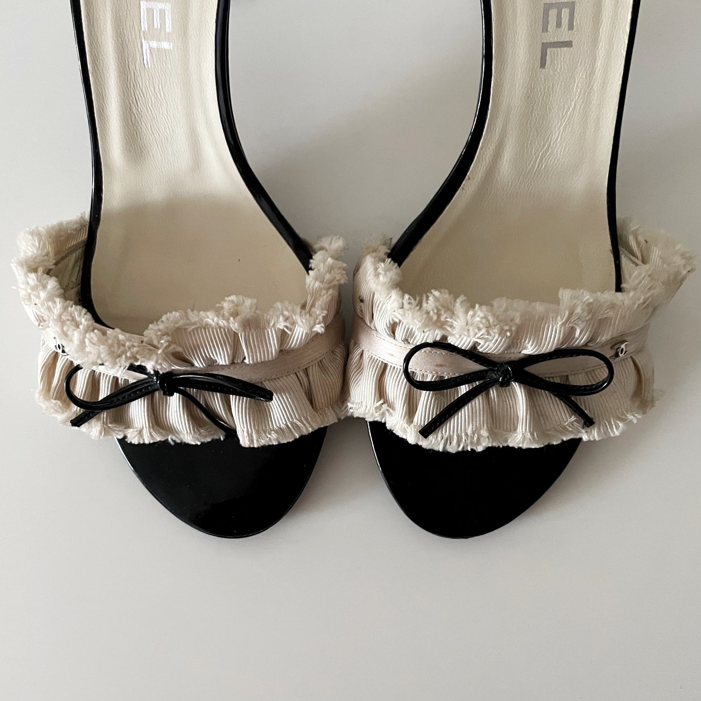 Chanel “CC” Ivory Ruffle Bow Sandal Heels