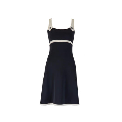 CHANEL 1996 “CC” Cruise Black Dress